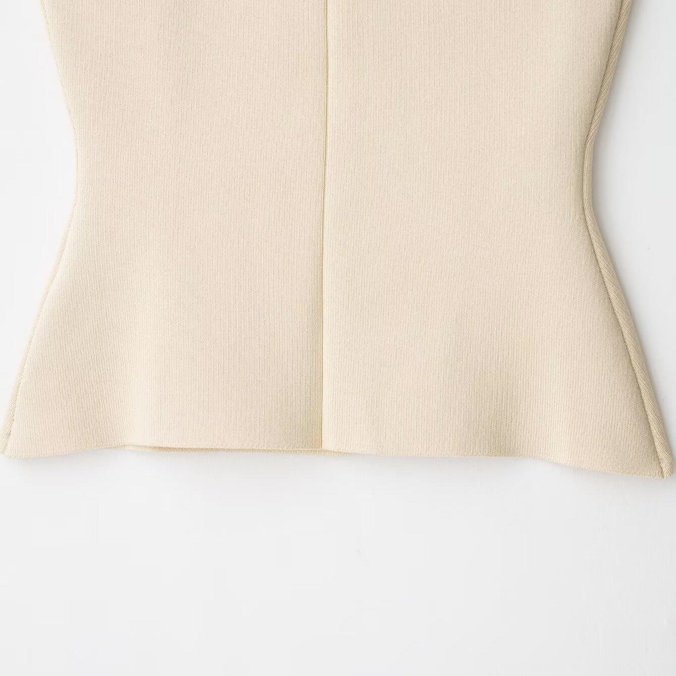 Round neck sleeveless single breasted waist cinched knit sweater for women
